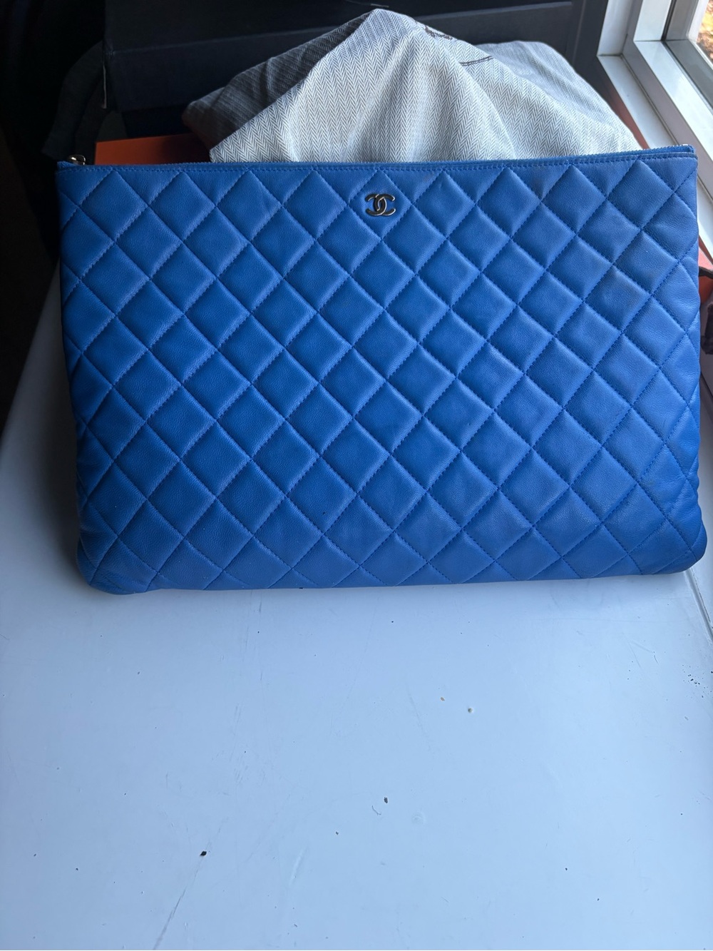 CHANEL Large Quilted Blue O Case